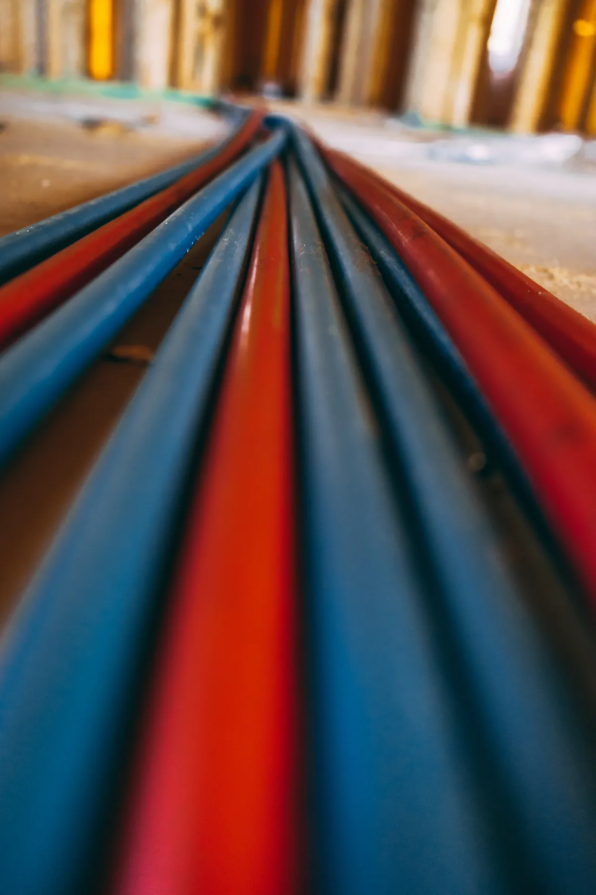 Coiled red and blue PEX tubing ready for a repipe – San Clemente Tankless Water Heater Installation for San Clemente, CA homes